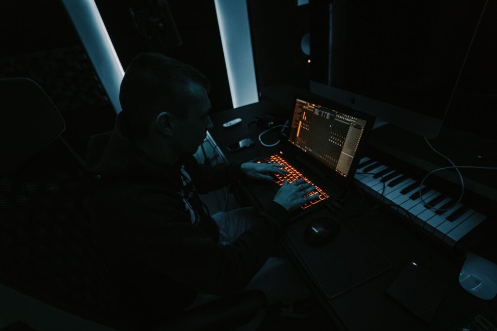 The secret cry for home inside Avicii's Hey Brother — lonely producer in dark music studio