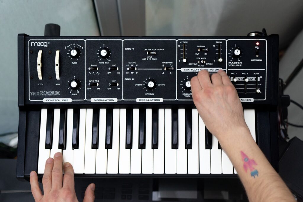 Why Deadmau5 and the legacy of Strobe still save us — vintage analog synthesizer in a dark music studio